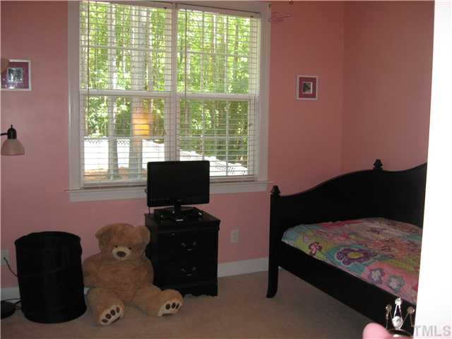 302 East Waycliff Road Henderson, NC 27537 - Photo 18 of 25 Another view of Bedroom #3 shows the large double window.