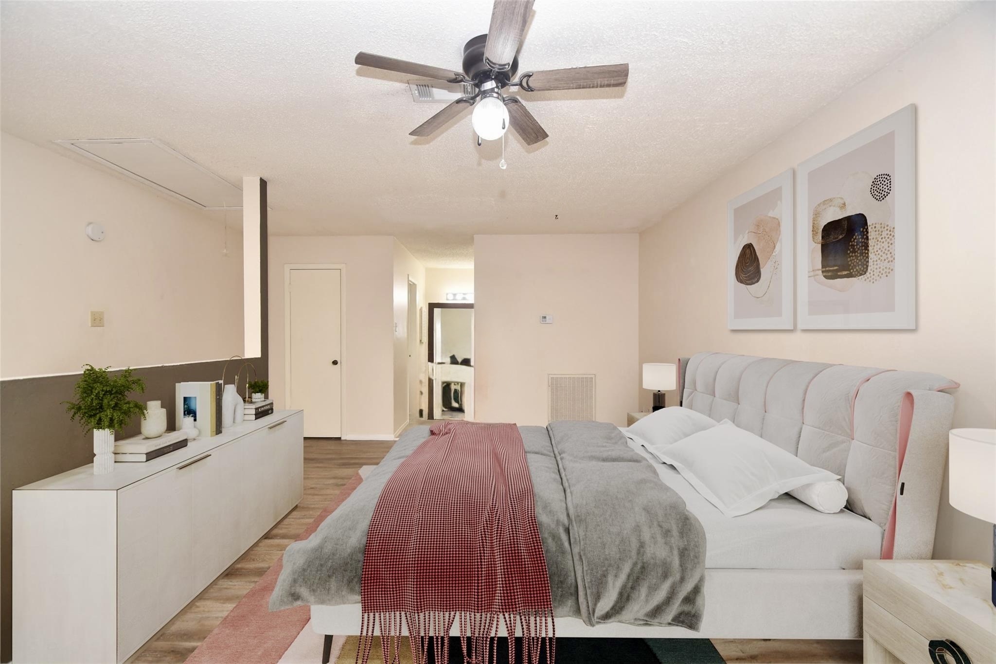 15336 West Little York Road, Unit 208 Houston, TX 77084 - Photo 16 of 33 a spacious bedroom with a bed and ceiling fan