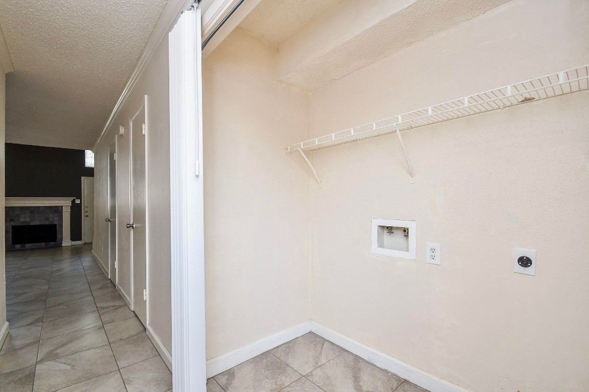 15336 West Little York Road, Unit 208 Houston, TX 77084 - Photo 25 of 33 a view of a hallway with wooden floor