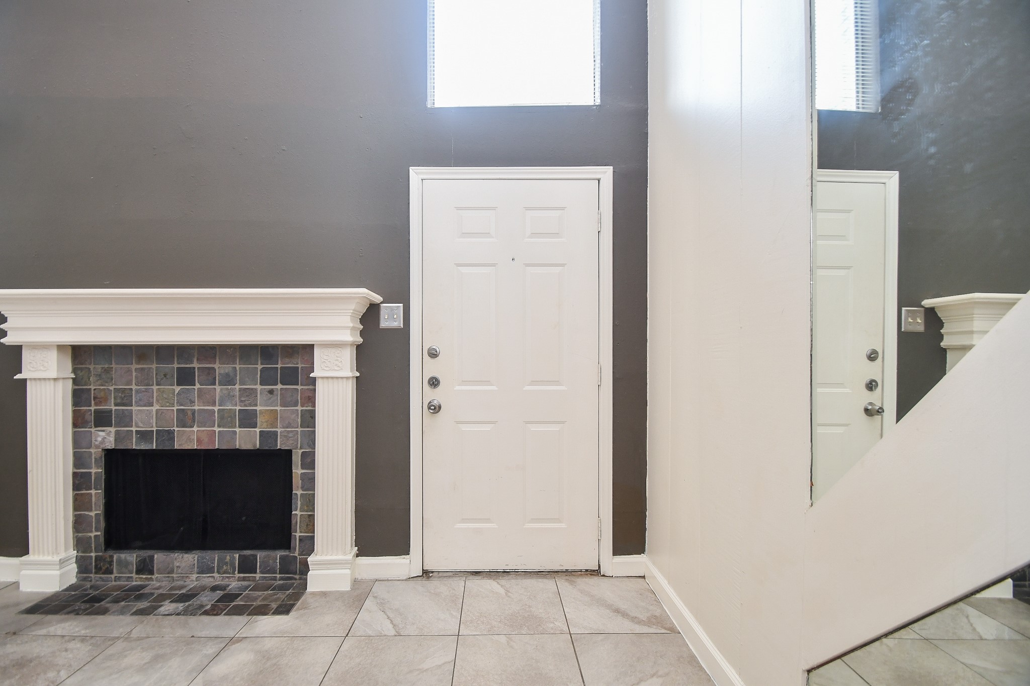 15336 West Little York Road, Unit 208 Houston, TX 77084 - Photo 4 of 33 a view of a livingroom with an empty space and fire place
