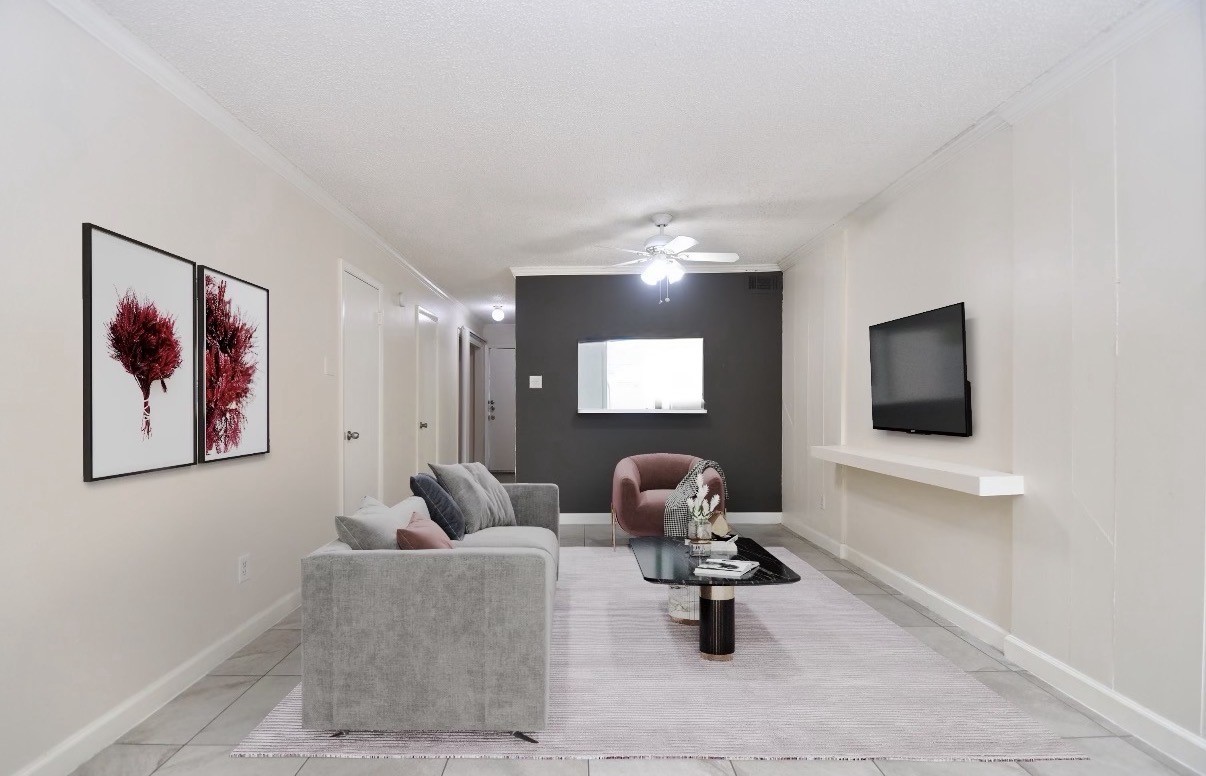 15336 West Little York Road, Unit 208 Houston, TX 77084 - Photo 8 of 33 a living room with furniture and wooden floor