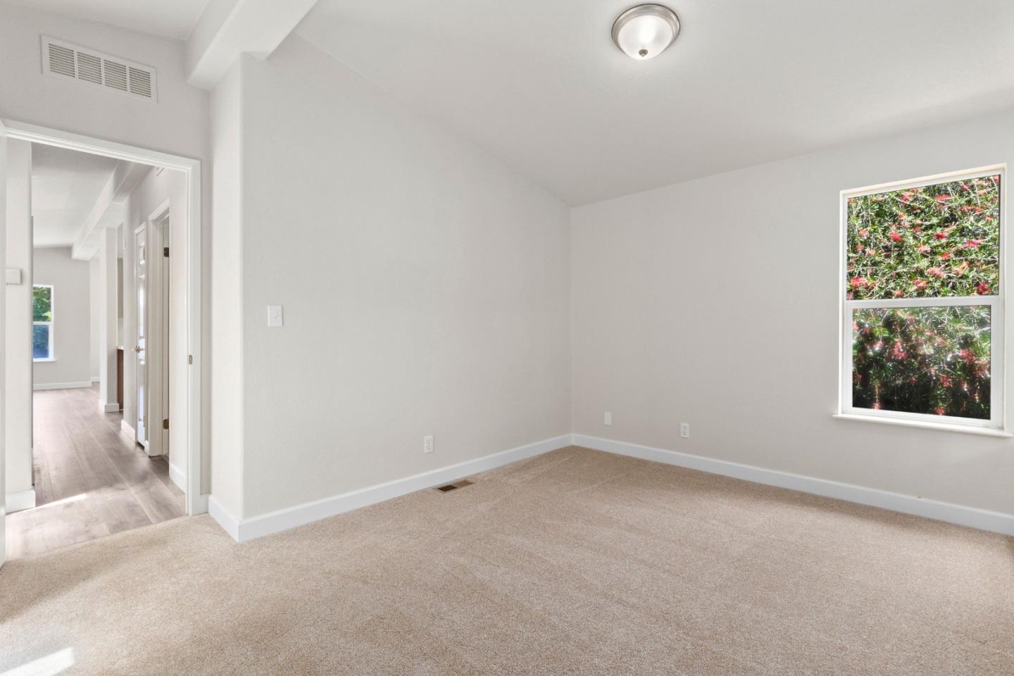 4300 Soquel Drive, Unit 96 Soquel, CA 95073 - Photo 12 of 29 an empty room with windows and closet