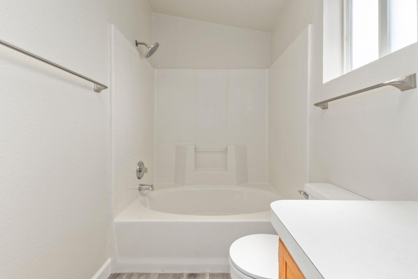 4300 Soquel Drive, Unit 96 Soquel, CA 95073 - Photo 14 of 29 a bathroom with a toilet and a bath tub