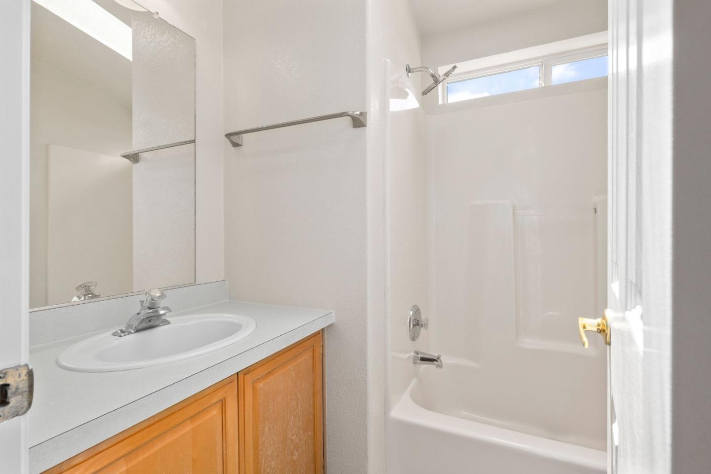 4300 Soquel Drive, Unit 96 Soquel, CA 95073 - Photo 18 of 29 a bathroom with a sink and a bathtub