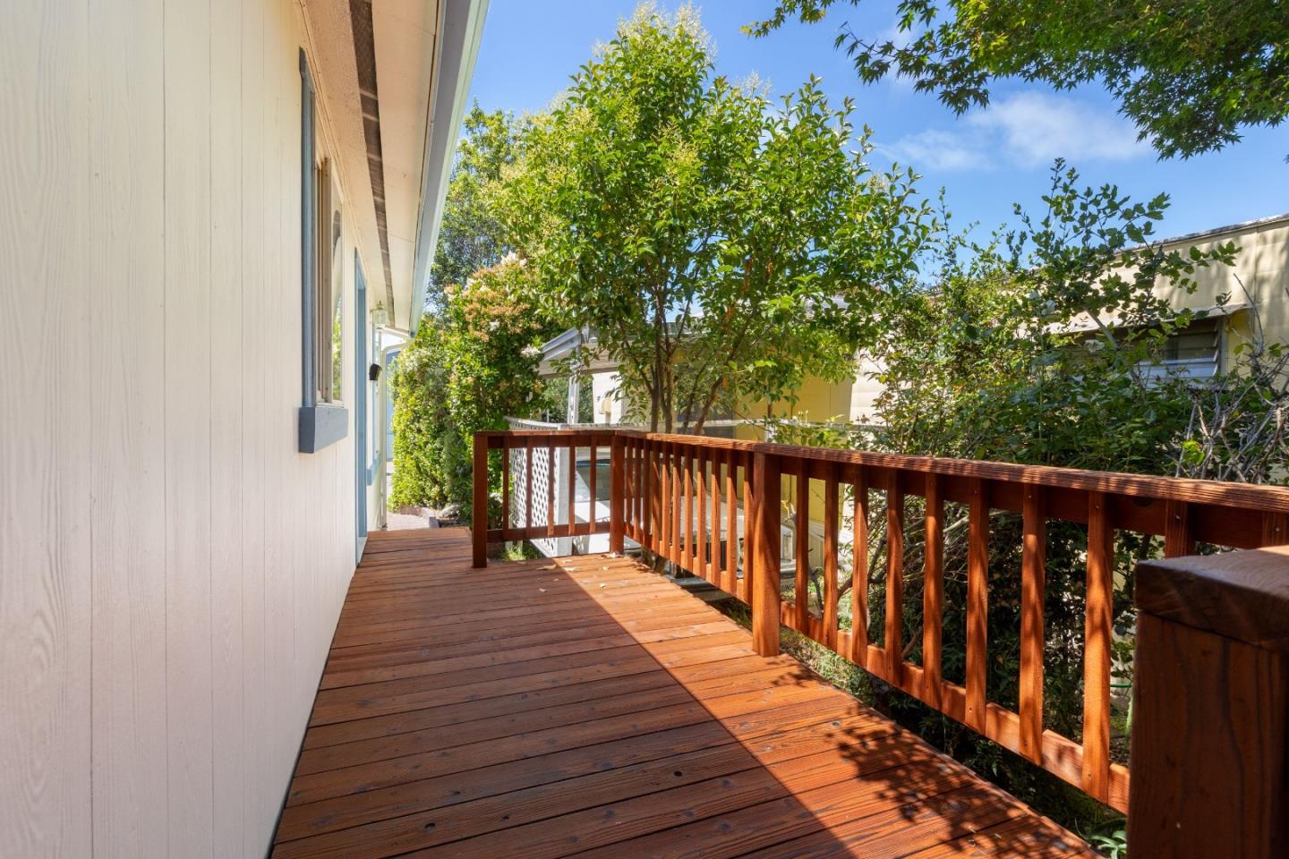 4300 Soquel Drive, Unit 96 Soquel, CA 95073 - Photo 21 of 29 a view of balcony with wooden floor and fence