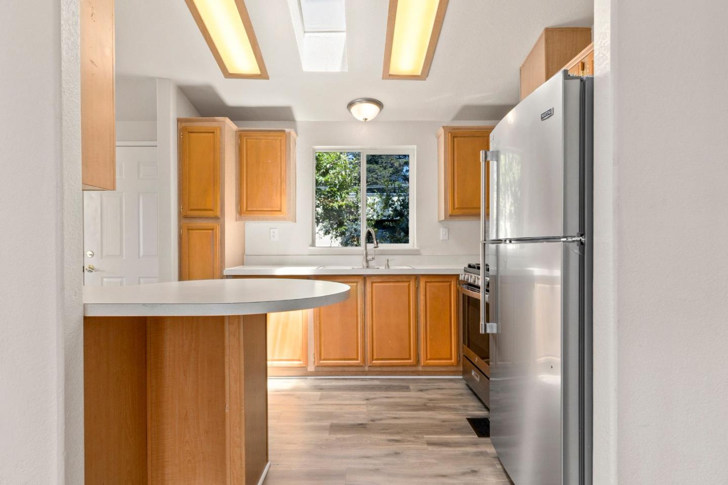 4300 Soquel Drive, Unit 96 Soquel, CA 95073 - Photo 6 of 29 a view of a kitchen with a sink and a window