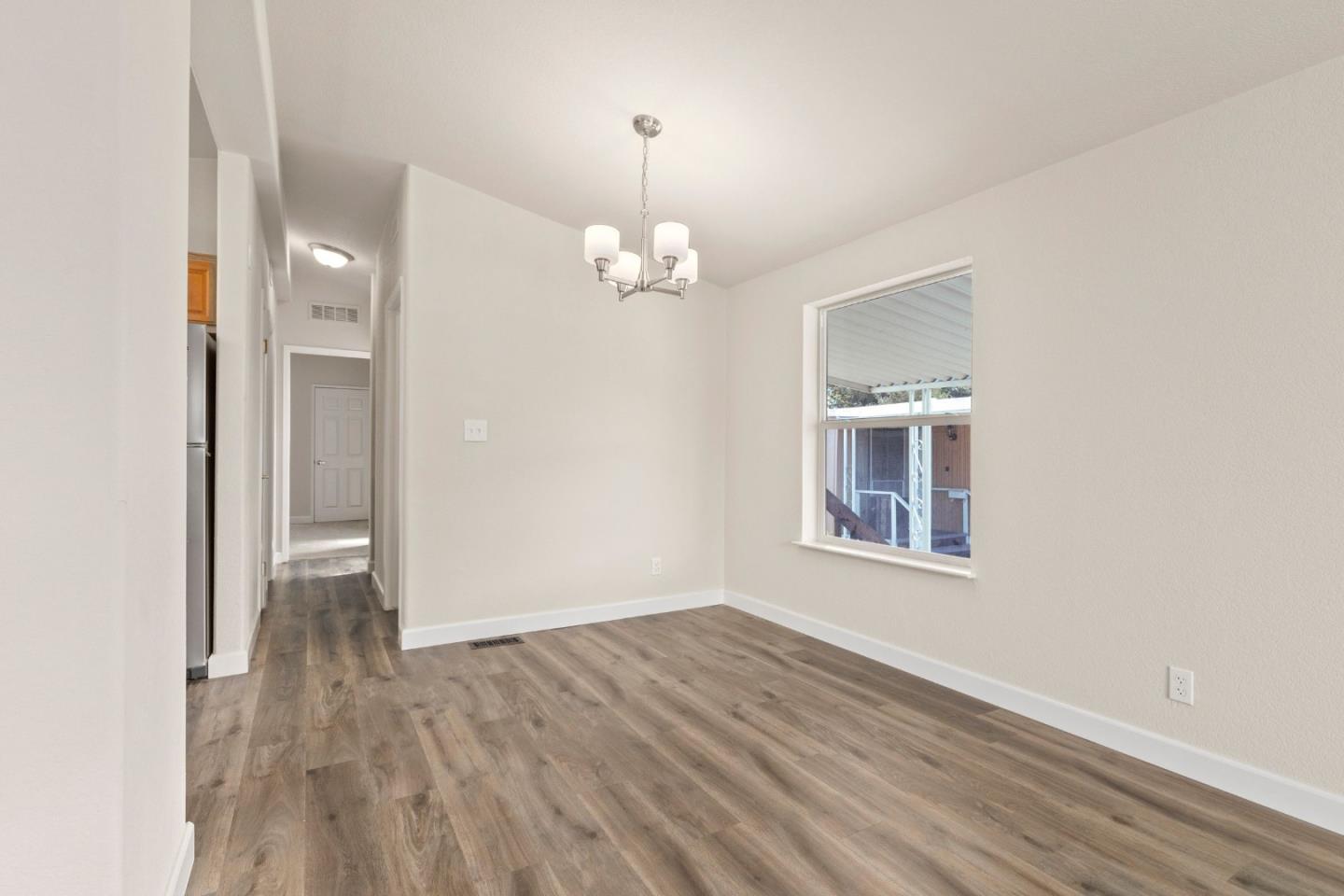 4300 Soquel Drive, Unit 96 Soquel, CA 95073 - Photo 10 of 29 a view of livingroom with hardwood floor and window