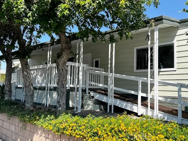 front view of a house with a small yard
