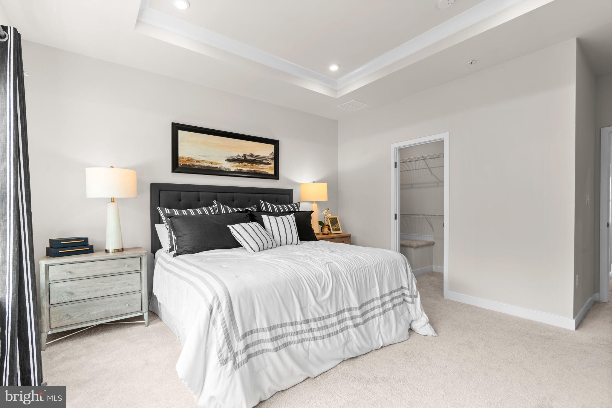 7932 Brandy Station Road Hanover, MD 21076 - Photo 19 of 49 a bedroom with a bed and a night stand