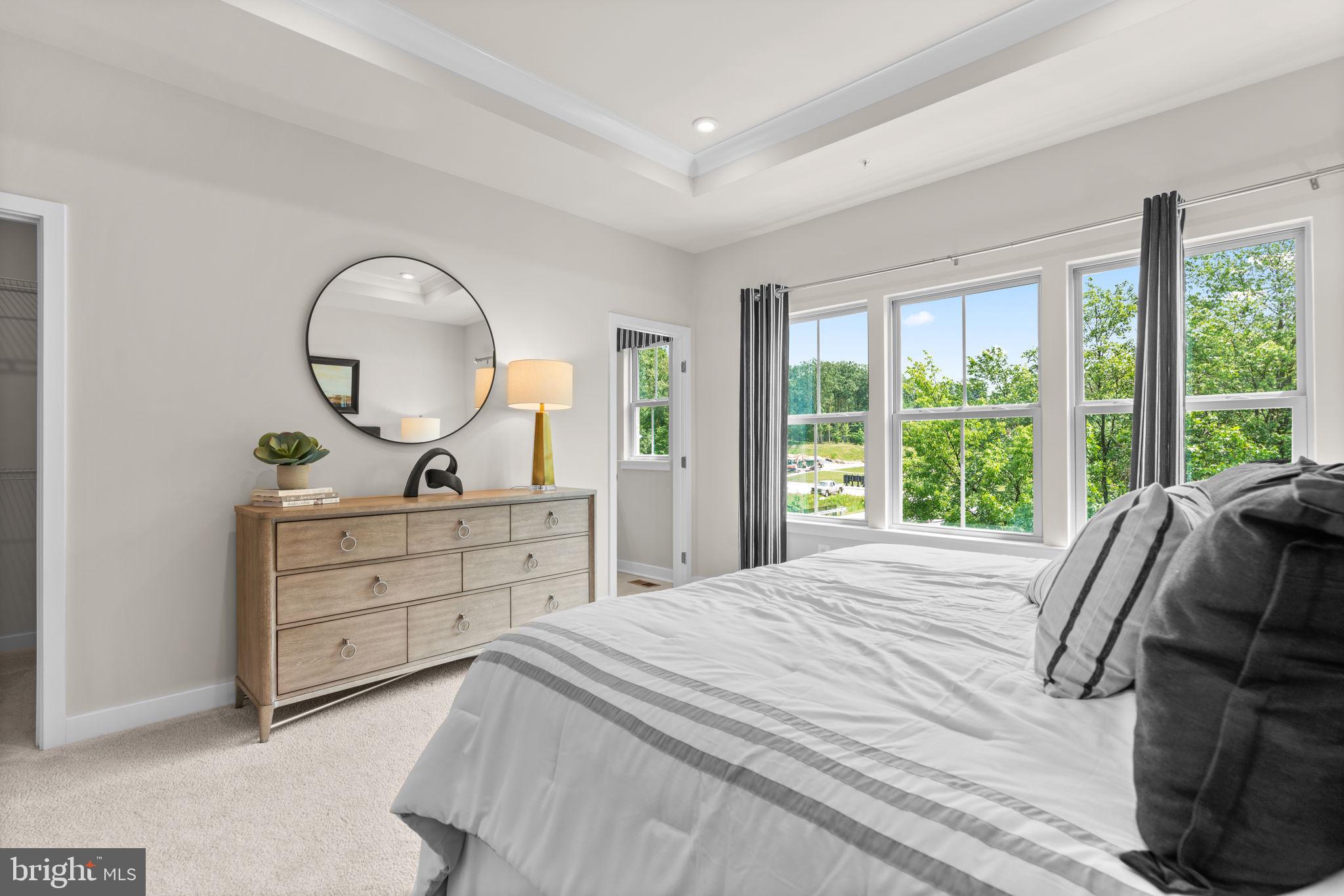 7932 Brandy Station Road Hanover, MD 21076 - Photo 21 of 49 a bed room with a bed and a mirror
