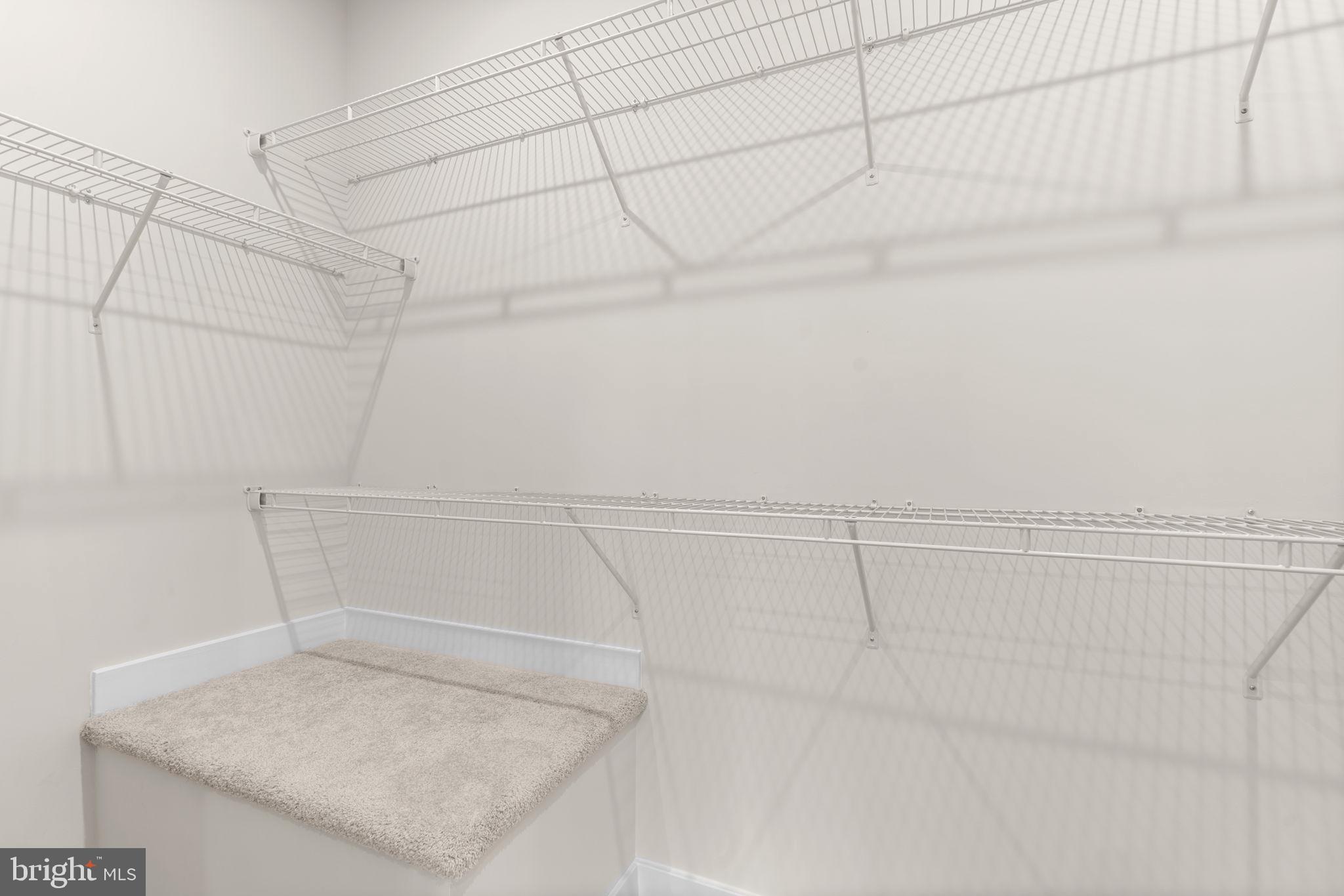 7932 Brandy Station Road Hanover, MD 21076 - Photo 25 of 49 a view of a room with racks on the wall