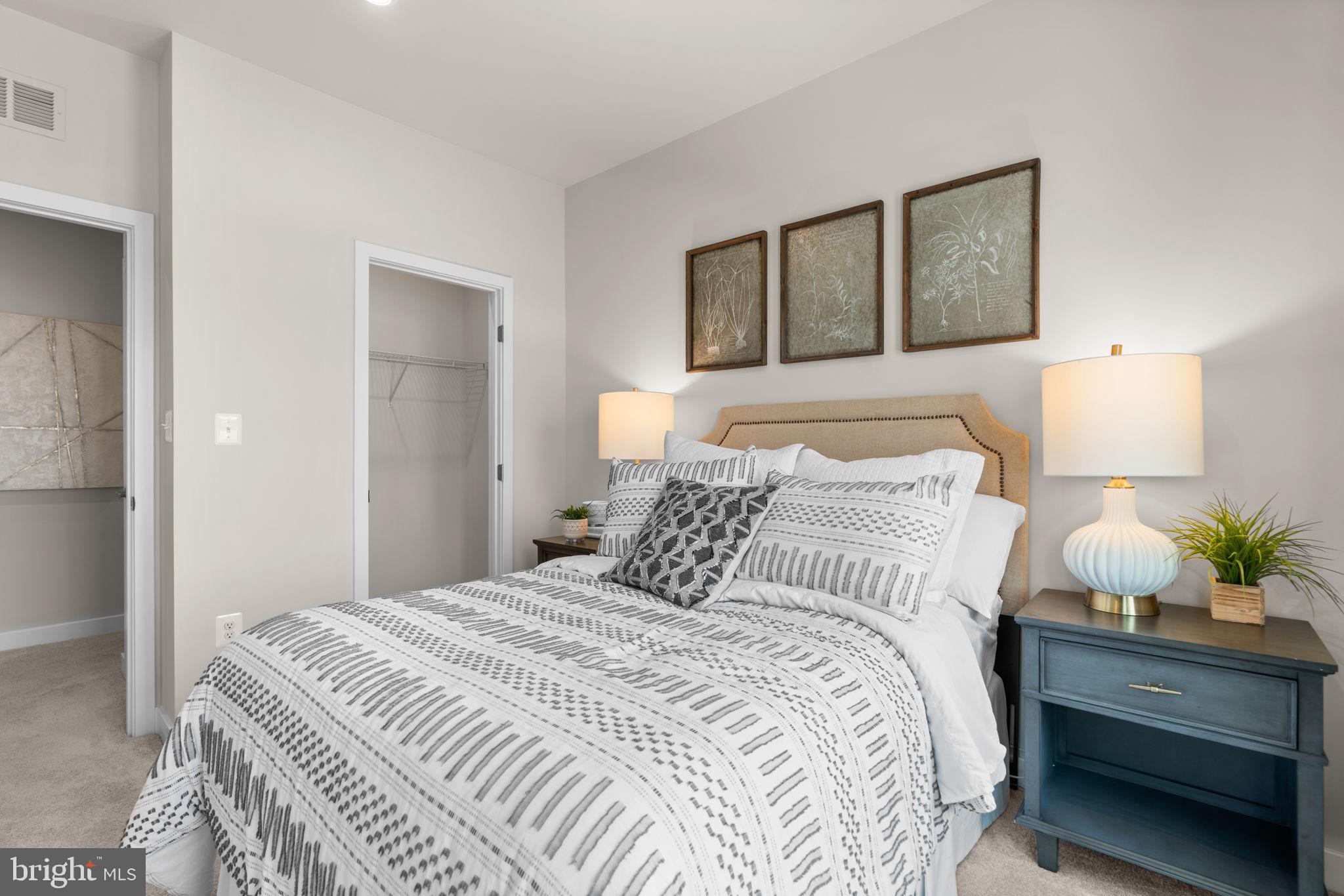 7932 Brandy Station Road Hanover, MD 21076 - Photo 27 of 49 a bedroom with a bed and painting on the wall