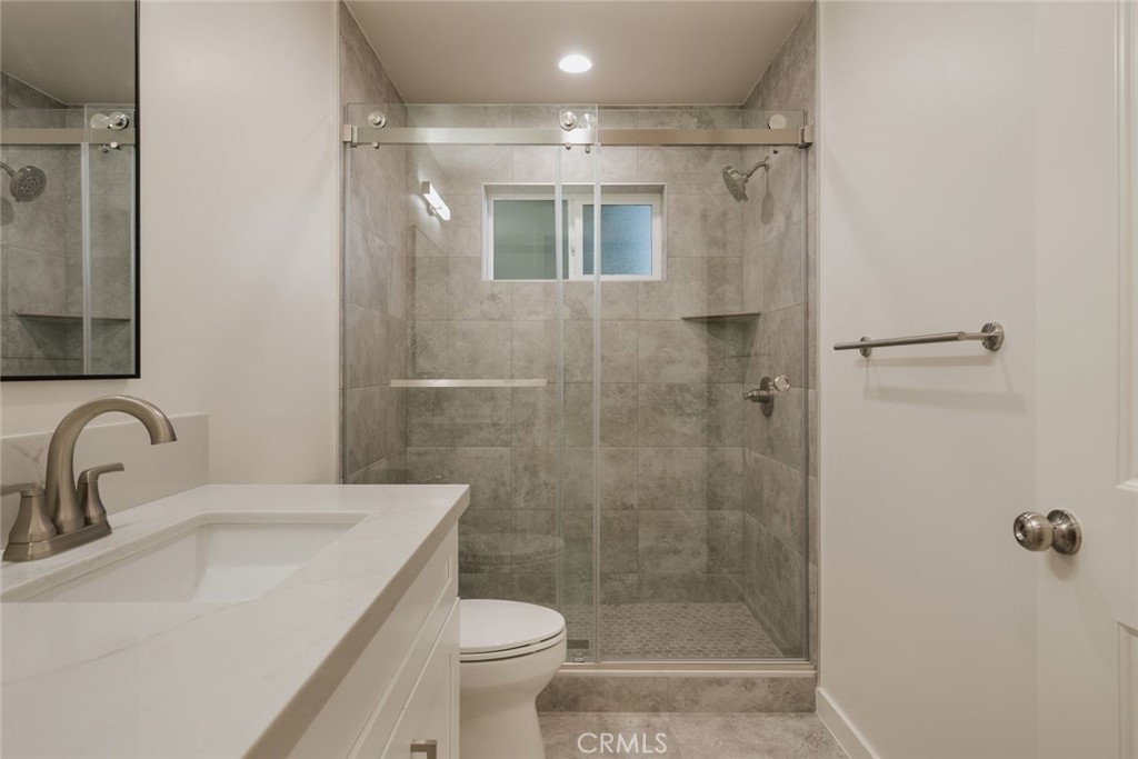 1806 South 8th Street, Unit B Alhambra, CA 91803 - Photo 43 of 44 a bathroom with a sink toilet and shower