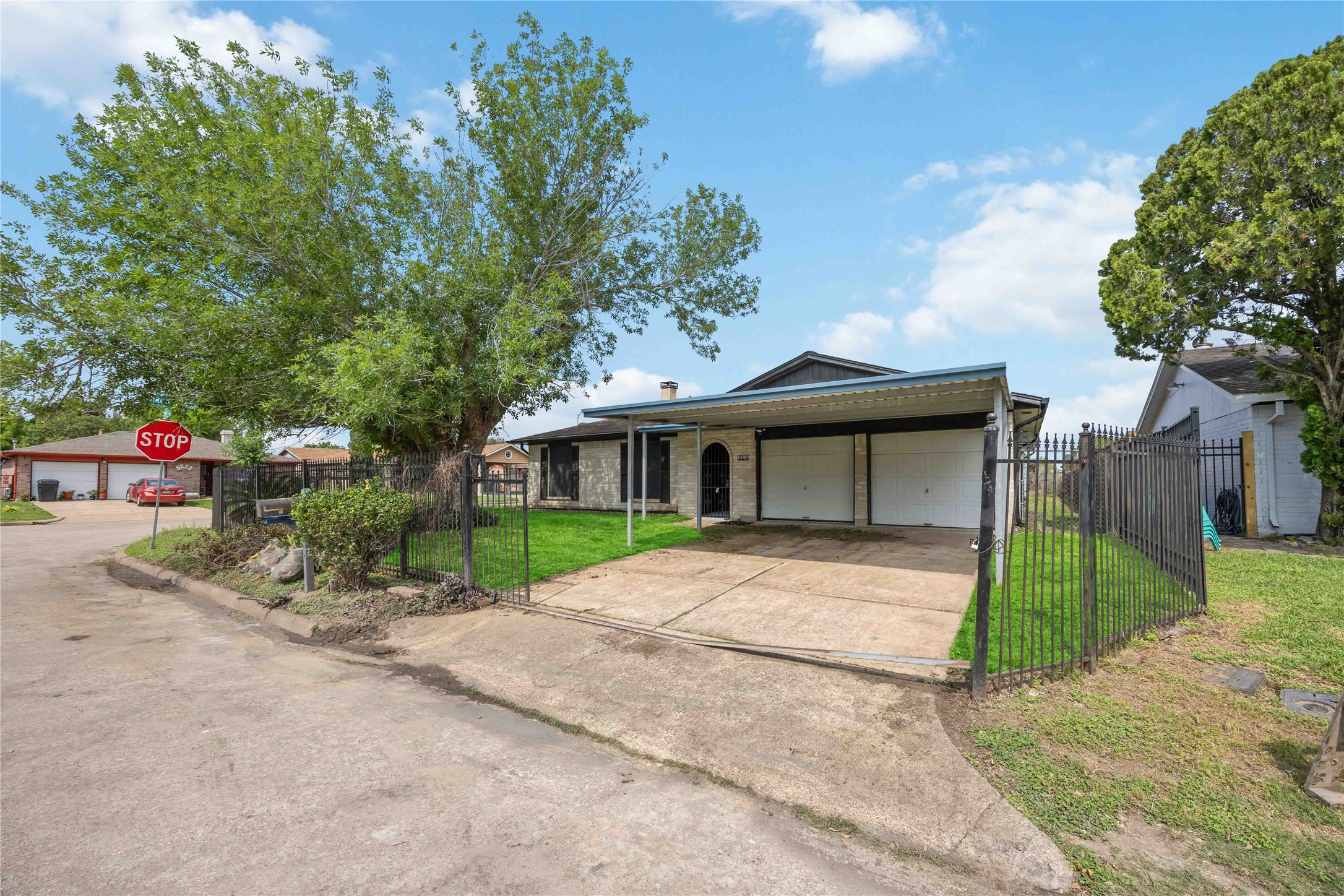 12703 Redfern Drive Houston, TX 77048 - Photo 1 of 28 Welcome to 12703 Redfern - Positioned on a desirable corner lot, this charming home features a spacious front yard, mature shade trees, and a fully fenced perimeter—offering both privacy and standout curb appeal with room to make it your own.