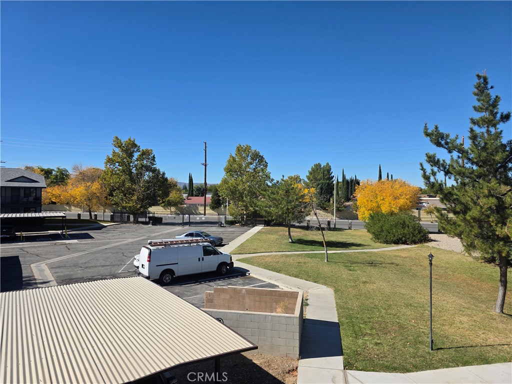 44036 25th Street West, Unit C8 Lancaster, CA 93536 - Photo 18 of 25 a view of a tennis court