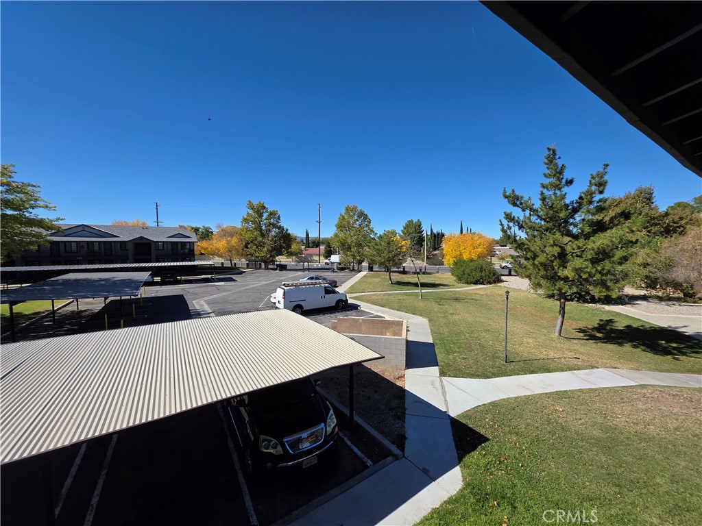 44036 25th Street West, Unit C8 Lancaster, CA 93536 - Photo 19 of 25 a terrace with a outdoor space