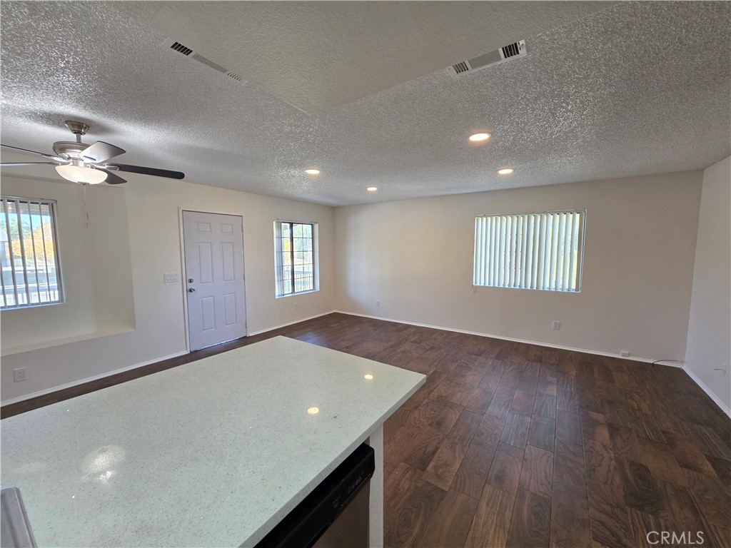 44036 25th Street West, Unit C8 Lancaster, CA 93536 - Photo 4 of 25 a view of an empty room with a window