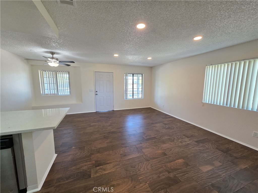44036 25th Street West, Unit C8 Lancaster, CA 93536 - Photo 7 of 25 a view of empty room with windows