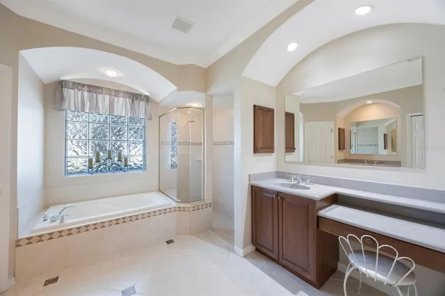 a bedroom with a bed and a closet