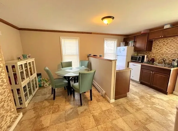 a view of a dining room with furniture