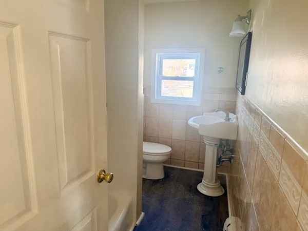 a bathroom with a toilet