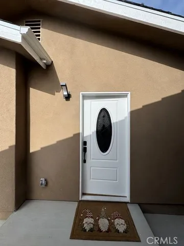 a view of entryway with microwave