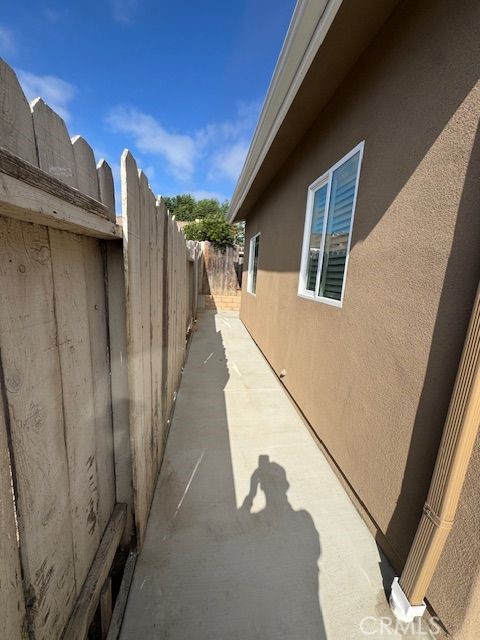 4546 Big Sur Street, Unit 2 Oceanside, CA 92057 - Photo 4 of 10 a view of a house with wooden stairs