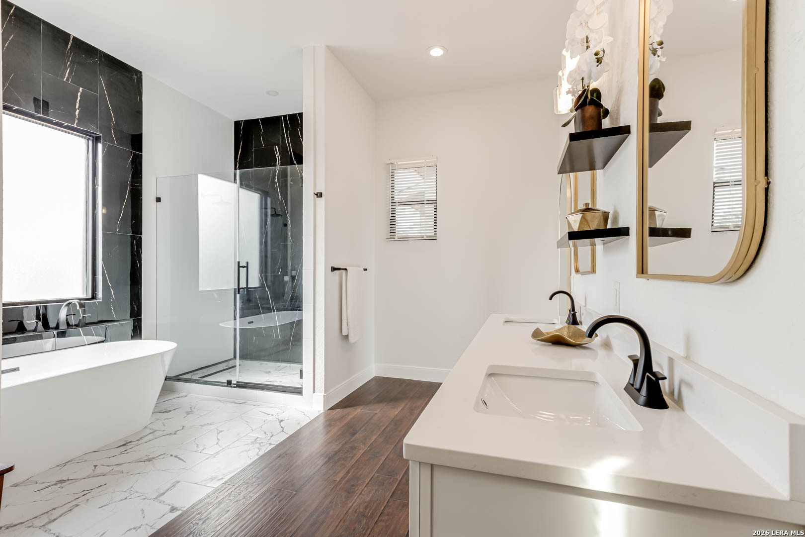 643 Mystic Parkway Spring Branch, TX 78070 - Photo 24 of 46 a bathroom with a sink and a mirror
