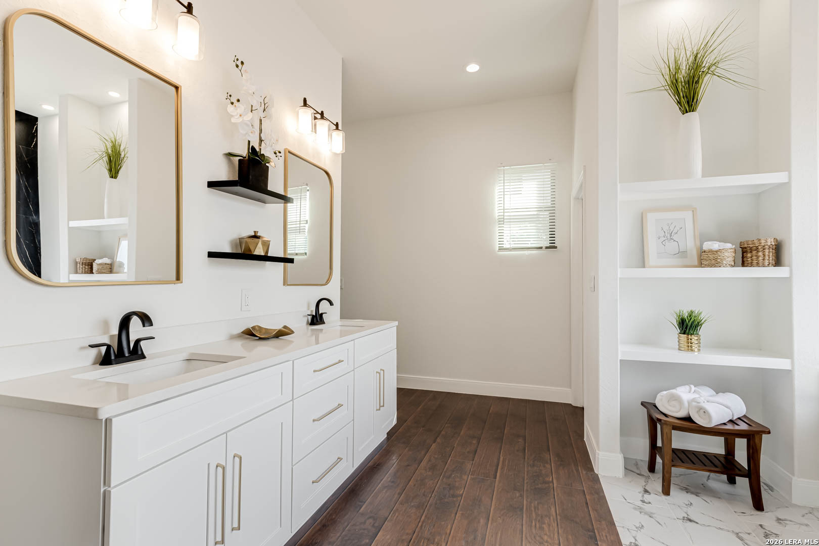 643 Mystic Parkway Spring Branch, TX 78070 - Photo 26 of 46 a bathroom with a double vanity sink and a mirror