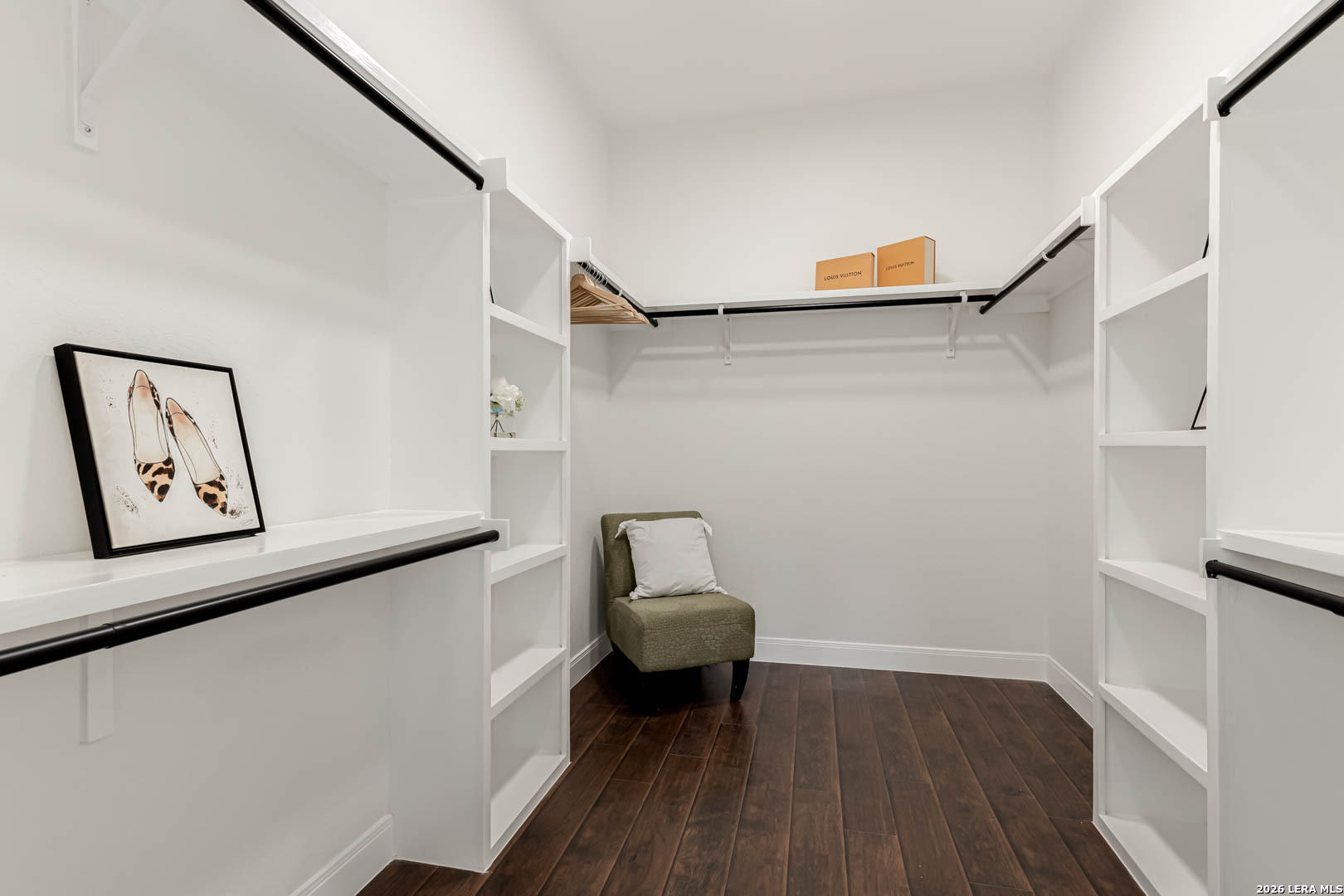 643 Mystic Parkway Spring Branch, TX 78070 - Photo 27 of 46 a hallway with a couch and a dining table with wooden floor