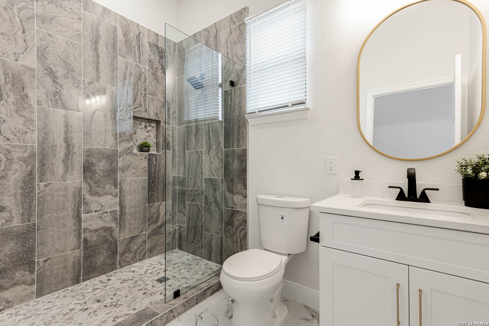 643 Mystic Parkway Spring Branch, TX 78070 - Photo 34 of 46 a bathroom with a sink toilet and shower