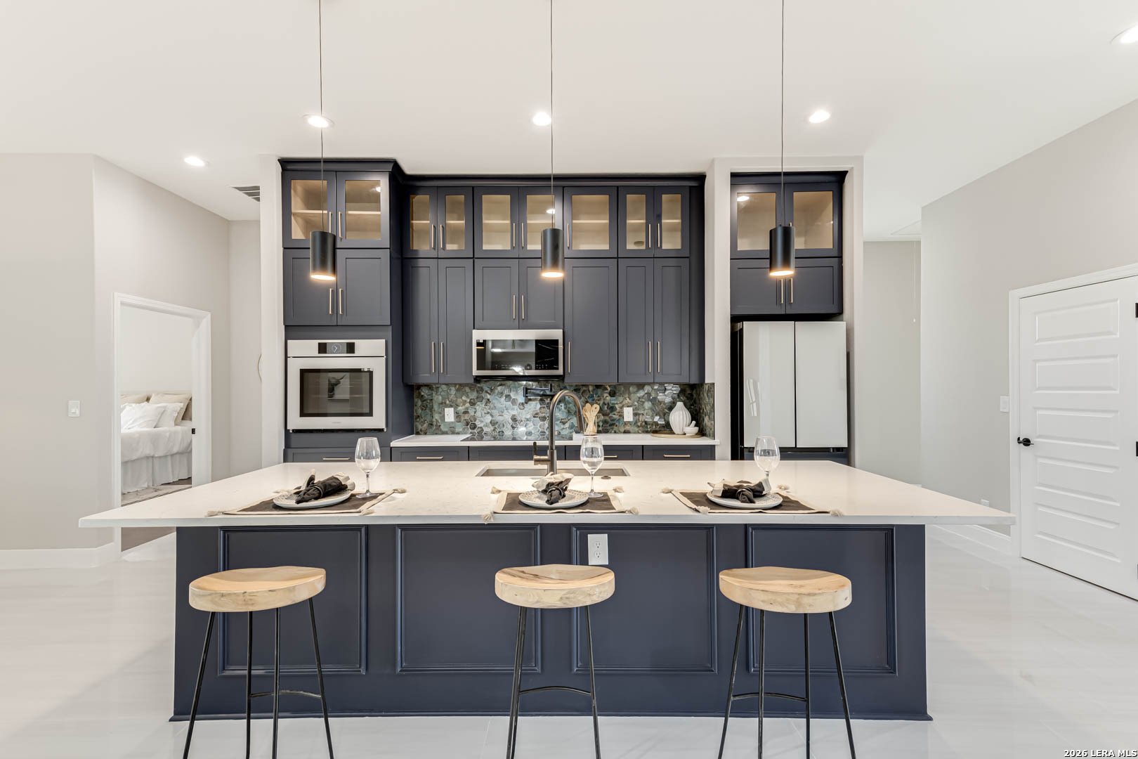 643 Mystic Parkway Spring Branch, TX 78070 - Photo 8 of 46 a kitchen with a counter space a sink and chairs