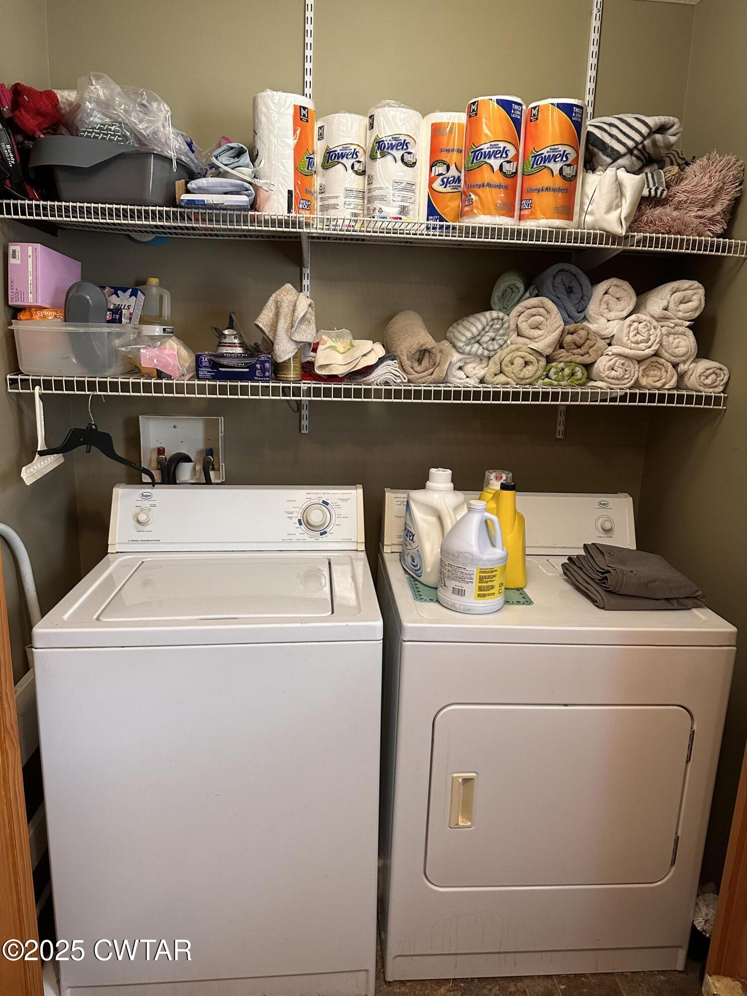 446 Miracle Road Decaturville, TN 38329 - Photo 21 of 22 a utility room with washer and dryer