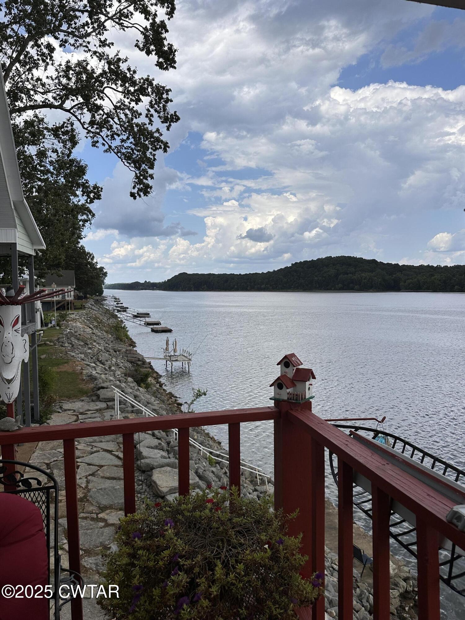 446 Miracle Road Decaturville, TN 38329 - Photo 3 of 22 a view of a balcony with an outdoor space