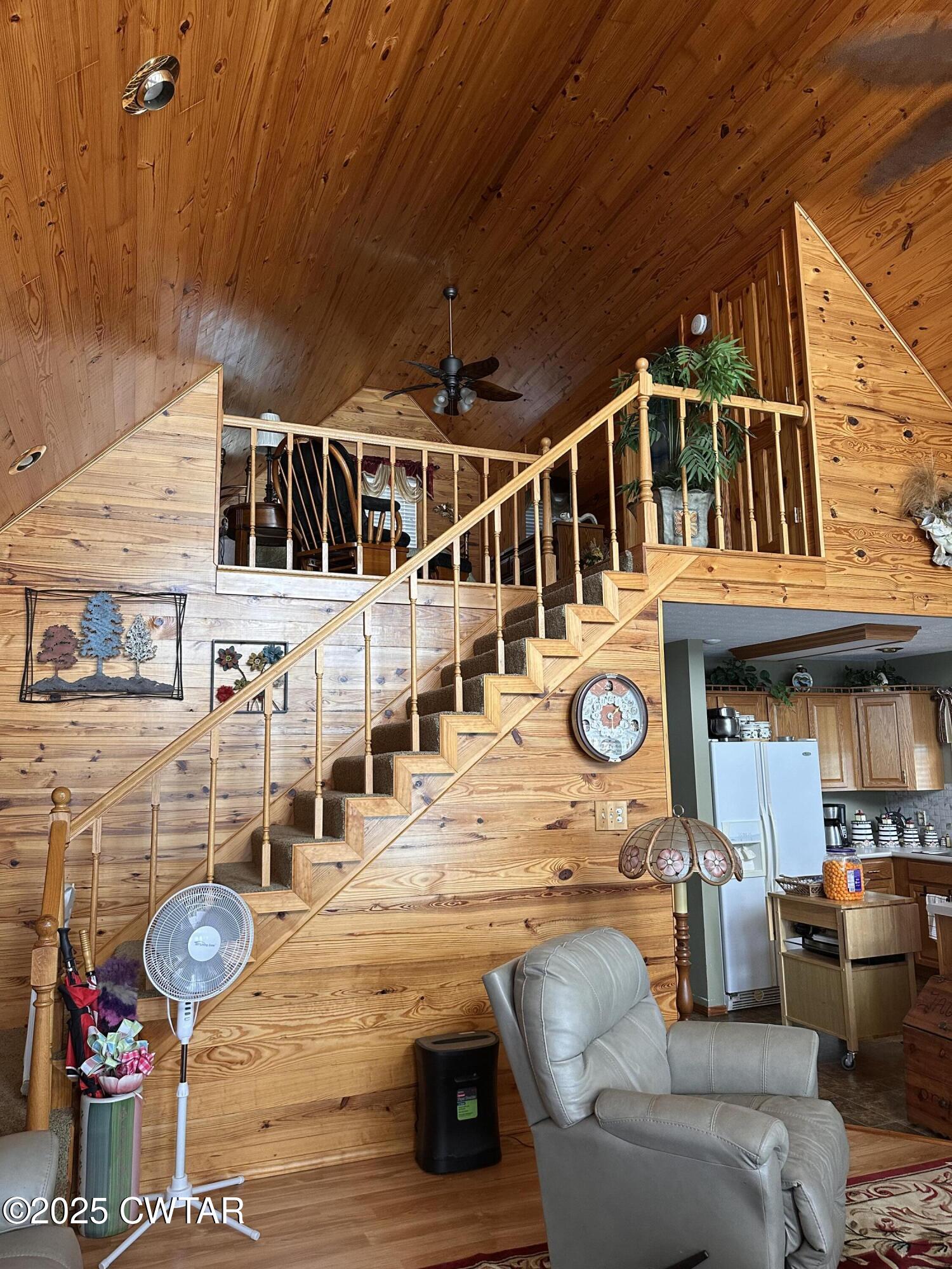 446 Miracle Road Decaturville, TN 38329 - Photo 9 of 22 a view of a house with backyard and sitting area