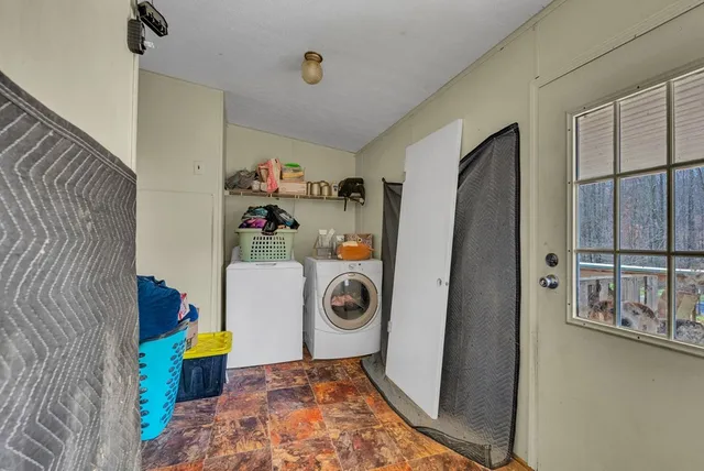 a utility room with dryer and washer