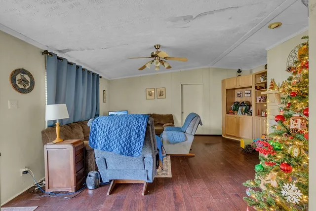 a living room with furniture and a table