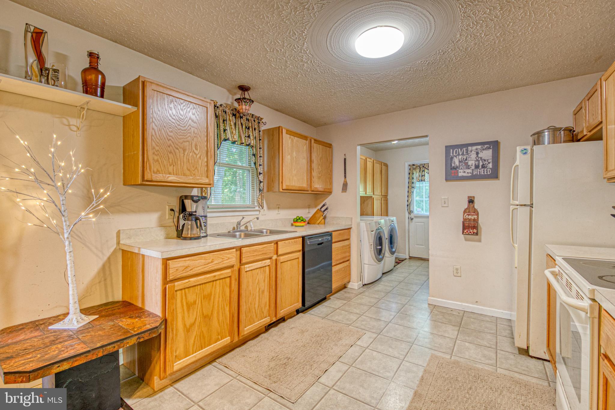115 Old Furnace Road Harpers Ferry, WV 25425 - Photo 15 of 41 Kitchen includes front loading washer and dryer