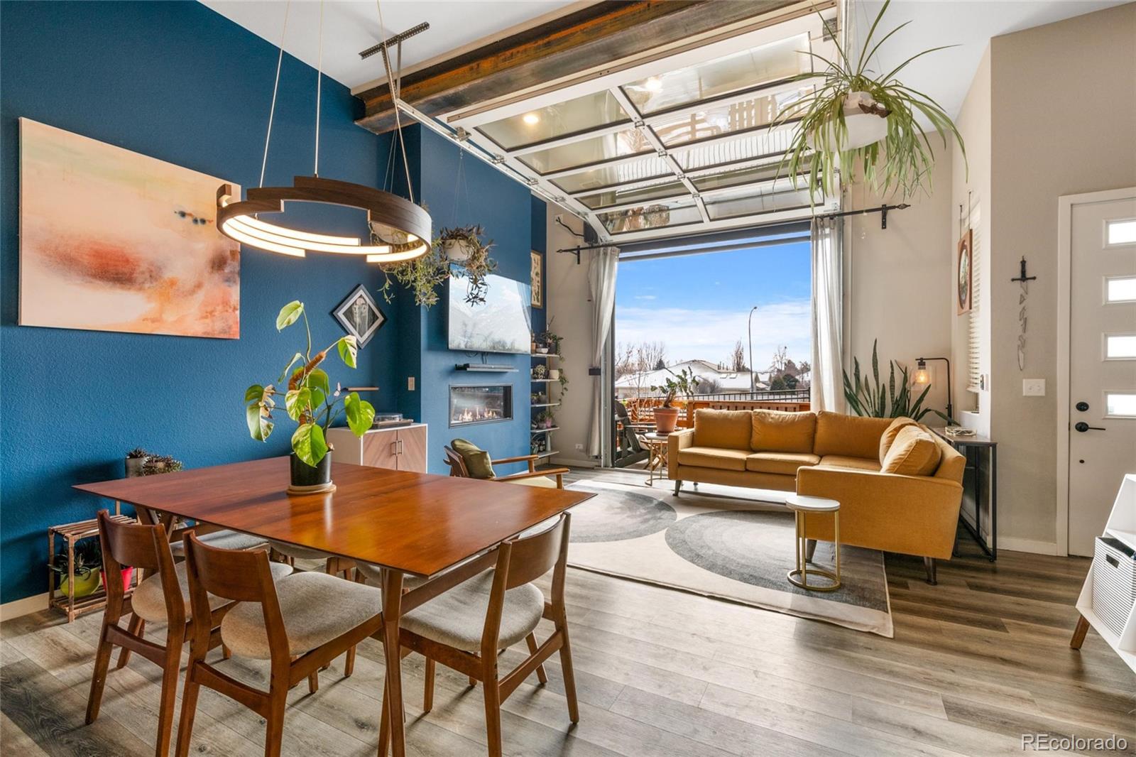 10105 Morrison Road Lakewood, CO 80227 - Photo 12 of 34 a dining room with furniture and window
