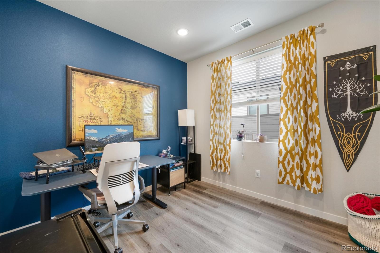 10105 Morrison Road Lakewood, CO 80227 - Photo 32 of 34 a workspace with furniture and a window