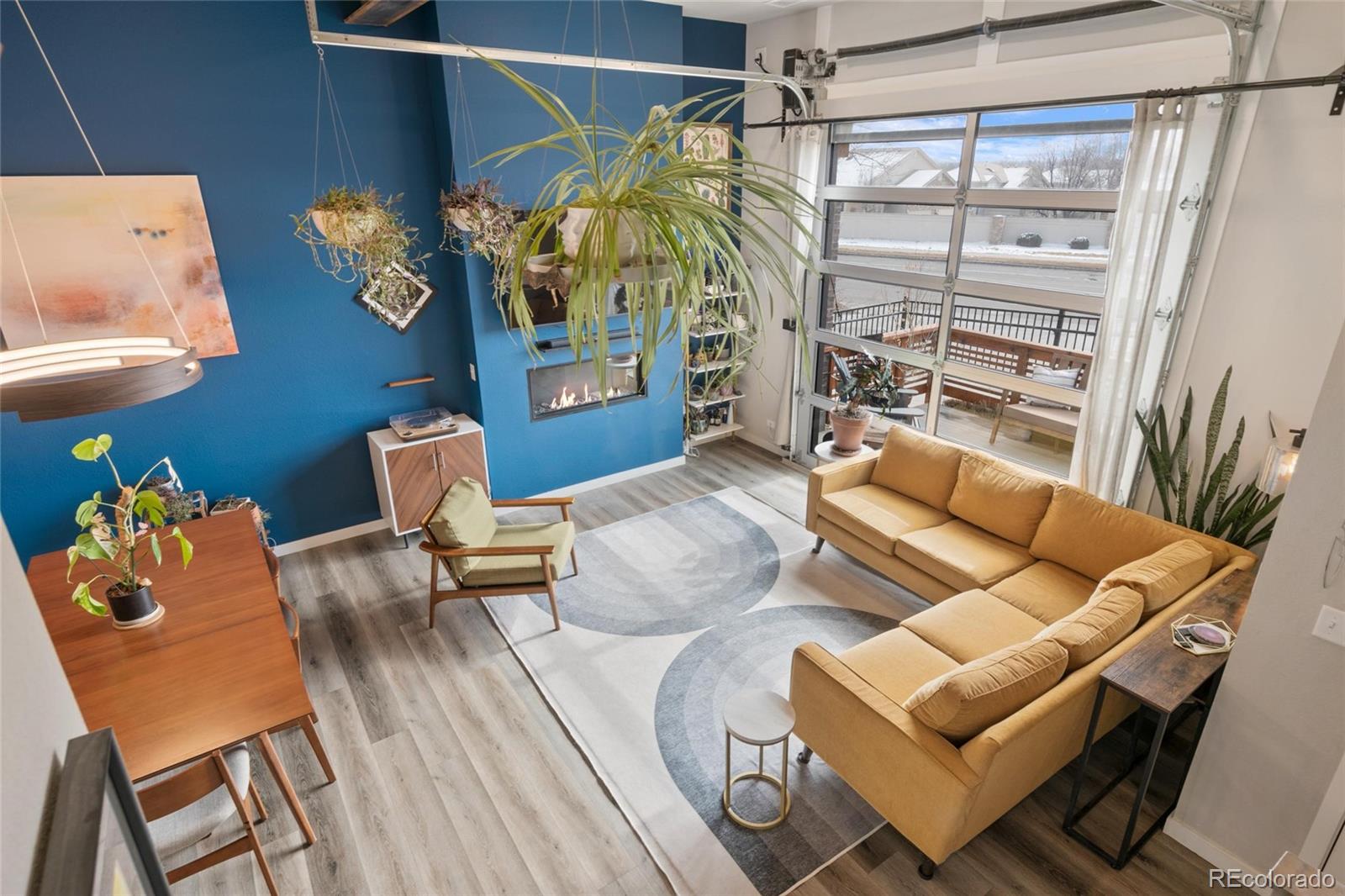 10105 Morrison Road Lakewood, CO 80227 - Photo 4 of 34 a living room with furniture and a window