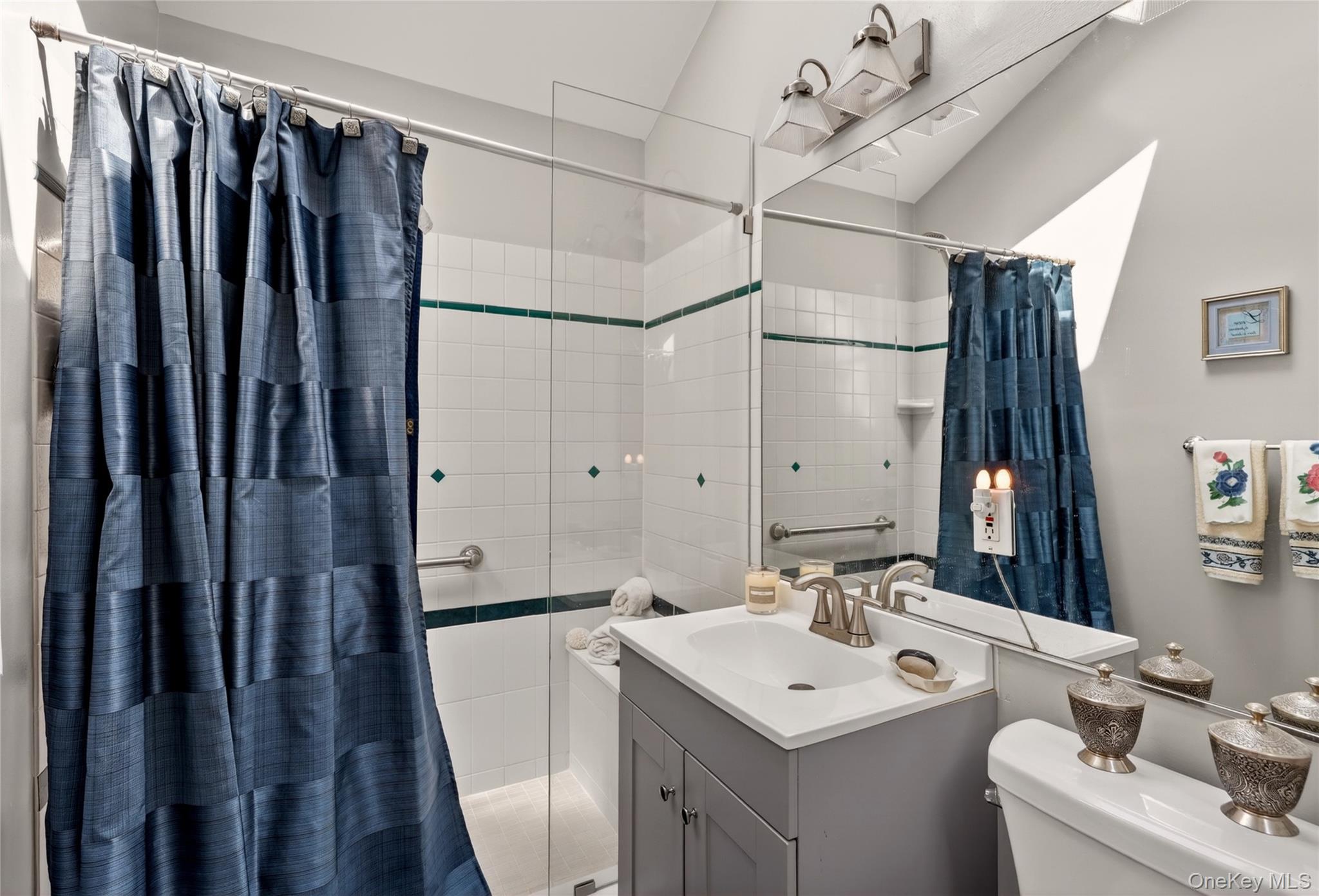 232 Cherry Road Yorktown Heights, NY 10598 - Photo 14 of 21 a bathroom with a sink a toilet and shower