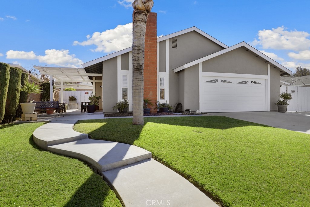 3185 Racine Drive Riverside, CA 92503 - Photo 1 of 1 a view of a house with a yard and pathway