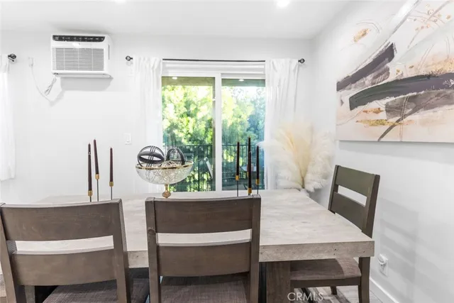 a view of a balcony and a floor to ceiling window