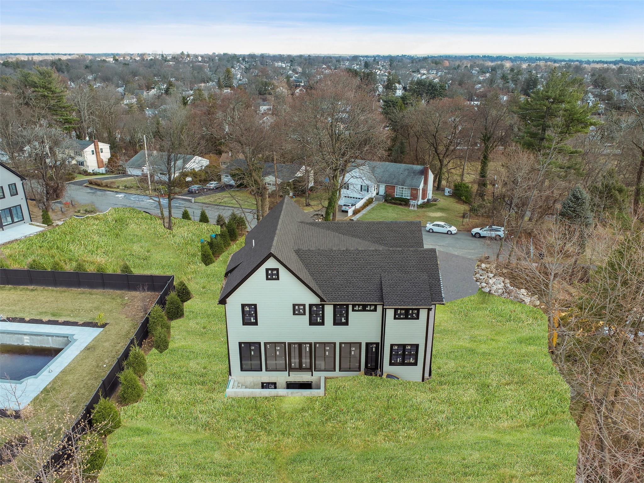 345 Betsy Brown Road Rye Brook, NY 10573 - Photo 3 of 34 an aerial view of a house