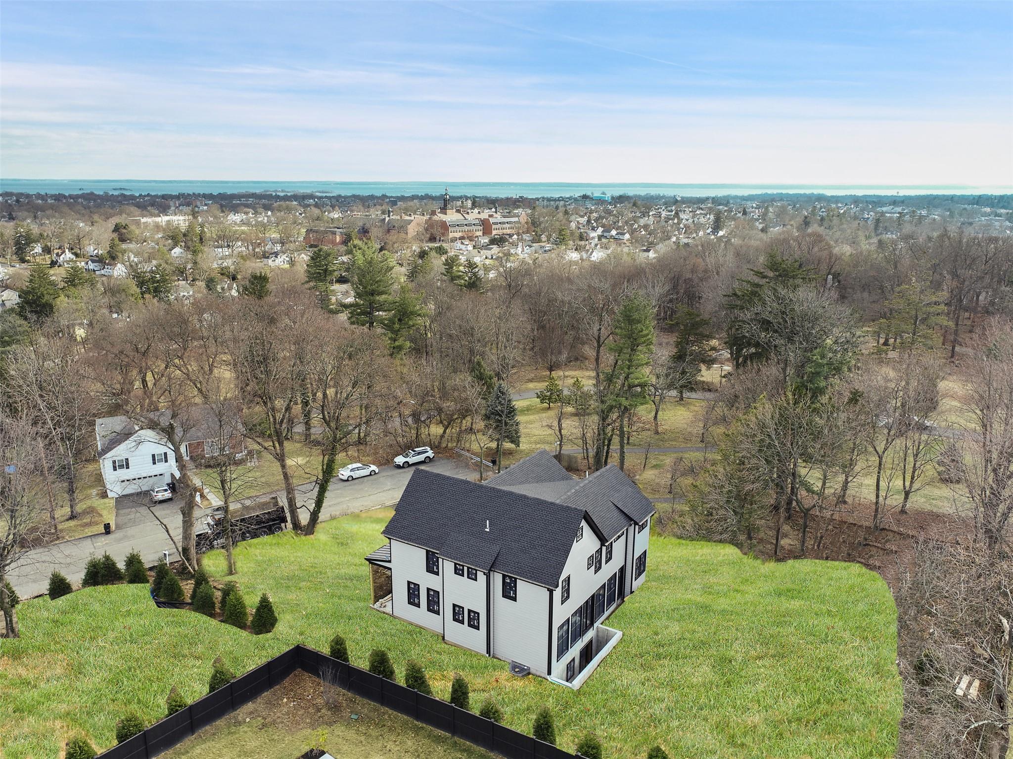 345 Betsy Brown Road Rye Brook, NY 10573 - Photo 33 of 34 an aerial view of a house with big yard