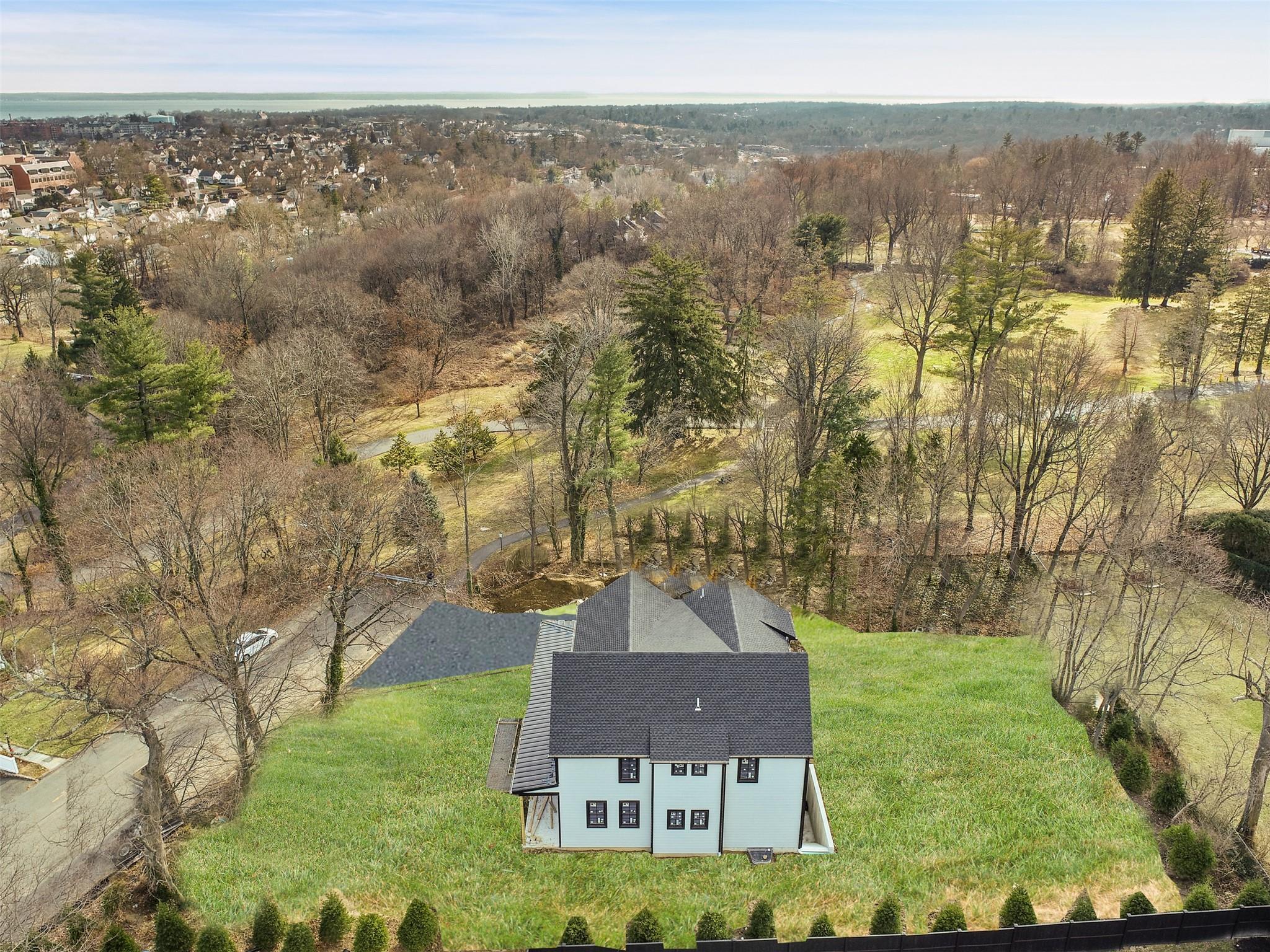 345 Betsy Brown Road Rye Brook, NY 10573 - Photo 34 of 34 a view of a city with mountains in the background
