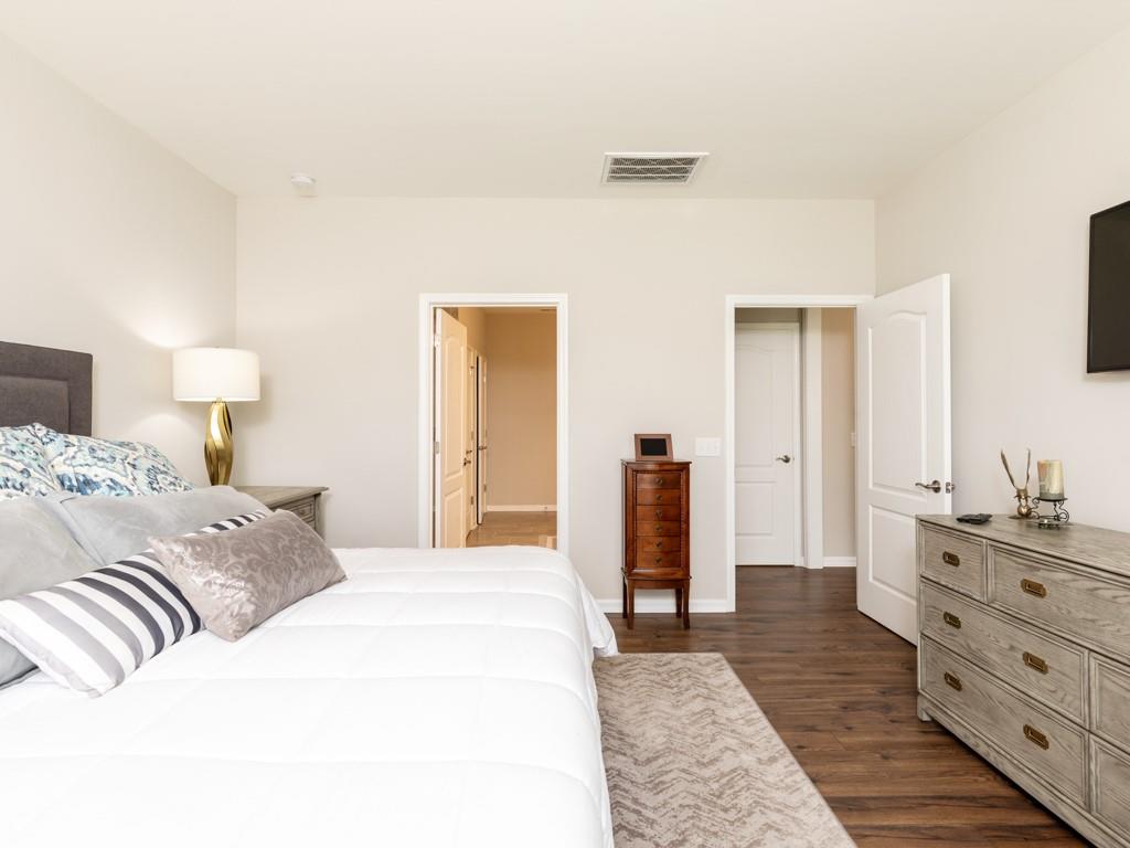 5292 Sweet Fig Way Fort Mill, SC 29715 - Photo 14 of 36 a bedroom with a bed and a dresser