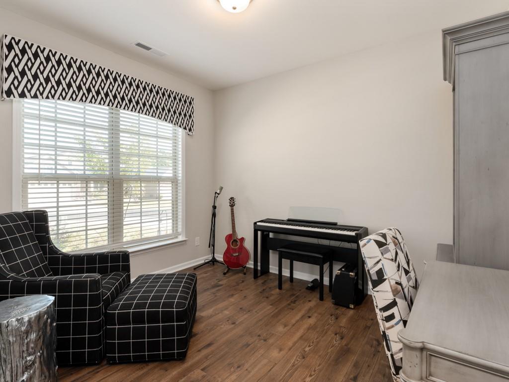 5292 Sweet Fig Way Fort Mill, SC 29715 - Photo 19 of 36 a room with chairs and a window