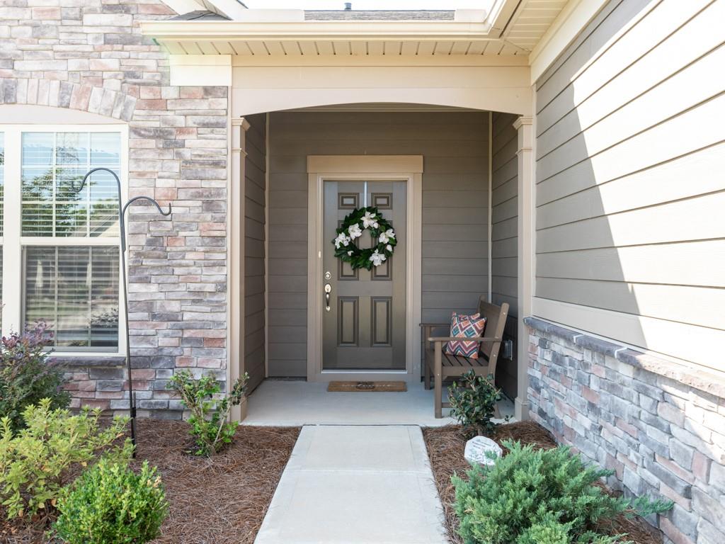 5292 Sweet Fig Way Fort Mill, SC 29715 - Photo 25 of 36 a front view of a house with a porch